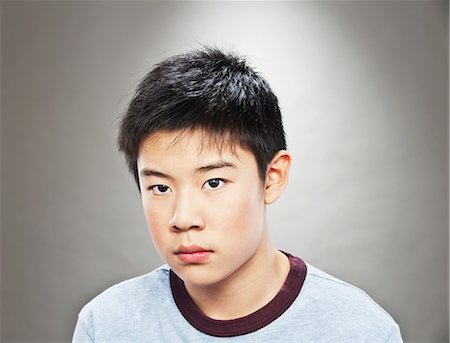 Portrait of young Asian teenage boy Foto de stock - Sin royalties Premium, Código: 614-06002195