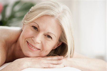 spa tranquility - Portrait of mature woman on massage table Stock Photo - Premium Royalty-Free, Code: 614-06002288