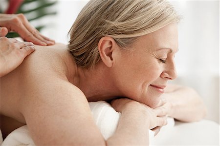 dyed hair - Mature woman receiving massage Stock Photo - Premium Royalty-Free, Code: 614-06002289