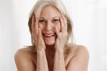 fair blonde beauty - Mature woman laughing, portrait Stock Photo - Premium Royalty-Free, Code: 614-06002294