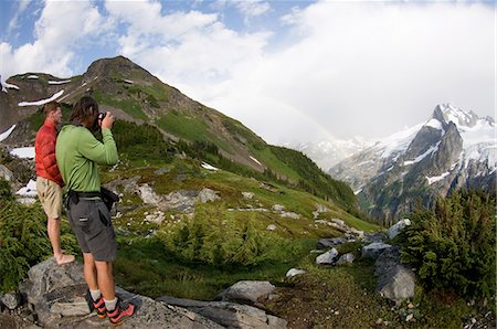 Photographing rainbow in mountains, White Rock Lakes, Ptarmigan Traverse, North Cascades, Washington, USA Stock Photo - Premium Royalty-Free, Code: 614-06002336