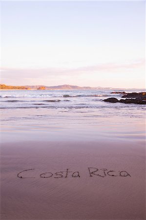 Costa Rica written in sand, Playa Grande, Santa Cruz, Costa Rica Stock Photo - Premium Royalty-Free, Code: 614-06002509