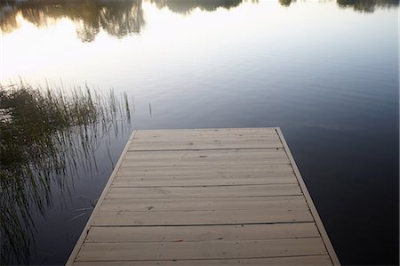 Wooden jetty and lake Stock Photo - Premium Royalty-Free, Code: 614-06002521
