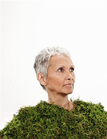 senior and spa - Senior woman wrapped in moss Stock Photo - Premium Royalty-Free, Code: 614-06002593