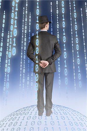 simsearch:614-06044020,k - Businessman standing on binary globe with binary strings Foto de stock - Sin royalties Premium, Código: 614-06044020