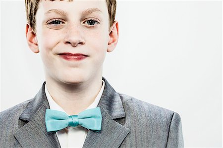 Boy wearing bow tie Stock Photo - Premium Royalty-Free, Code: 614-06044044