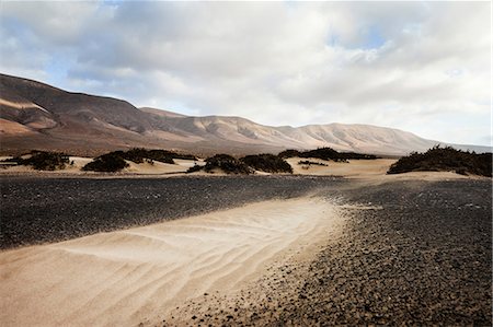 Sable et paysage de Famara beach, îles Canaries, Espagne Photographie de stock - Premium Libres de Droits, Code: 614-06044114