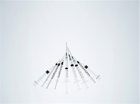 Syringes, studio shot Fotografie stock - Premium Royalty-Free, Codice: 614-06044143