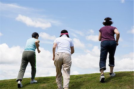 Three senior women walking up a hill Stock Photo - Premium Royalty-Free, Code: 614-06044647