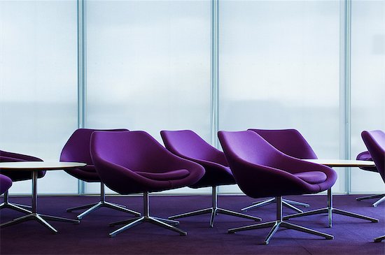 Purple armchairs in empty office block Stock Photo - Premium Royalty-Free, Image code: 614-06044743