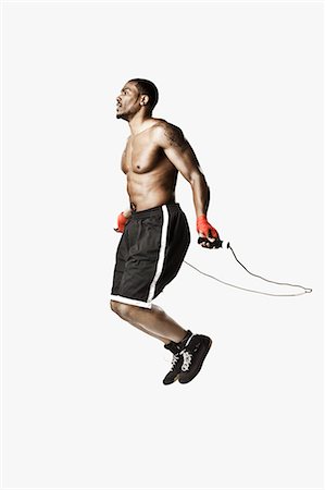 serious fitness - Boxer skipping Stock Photo - Premium Royalty-Free, Code: 614-06043566