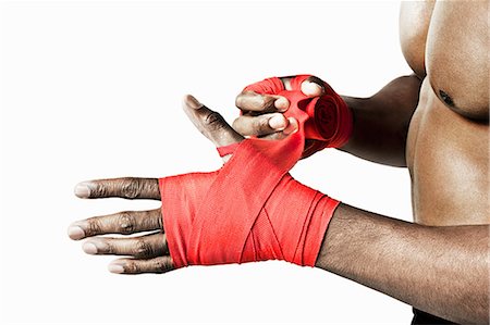 fitness close up - Boxer wrapping hand Stock Photo - Premium Royalty-Free, Code: 614-06043563