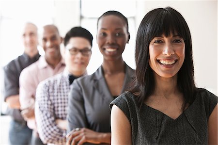 portrait business hispanic - Portrait of businesspeople in a line Stock Photo - Premium Royalty-Free, Code: 614-06043793