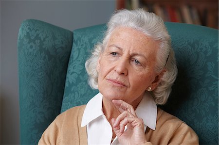 senior woman alone thinking - Pensive senior woman, portrait Stock Photo - Premium Royalty-Free, Code: 614-06043853