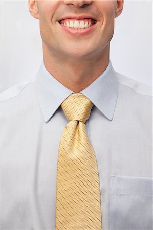 primer plano - Young man wearing tie, close up portrait Foto de stock - Sin royalties Premium, Código: 614-06043939