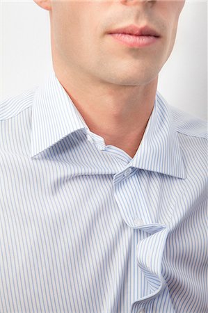 shirt closeup - Young man with messy shirt Stock Photo - Premium Royalty-Free, Code: 614-06043965