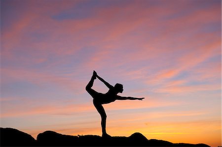 female yoga pictures - Young woman in dancer pose in desert, silhouette Stock Photo - Premium Royalty-Free, Code: 614-06116401