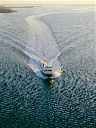 Power boat, aerial view Stock Photo - Premium Royalty-Free, Code: 614-06116412