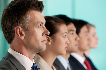 simsearch:614-06116477,k - Multi racial businesspeople in a line, portrait Stock Photo - Premium Royalty-Free, Code: 614-06116476