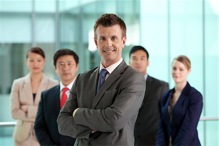 Multi racial businesspeople, portrait Stock Photo - Premium Royalty-Free, Code: 614-06116477