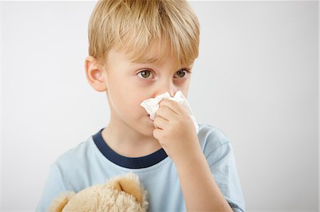 sick boy with teddy - Boy with cold Stock Photo - Premium Royalty-Free, Code: 614-06168881