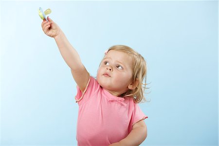 Girl holding pacifier Fotografie stock - Premium Royalty-Free, Codice: 614-06168897