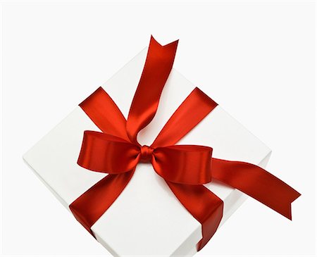 schleife - Gift box with red ribbon Foto de stock - Sin royalties Premium, Código: 614-06169225