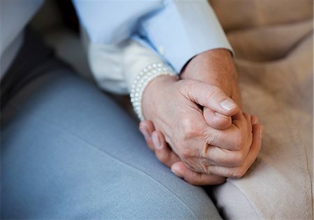 dependency - Senior couple holding hands Stock Photo - Premium Royalty-Free, Code: 614-06169257