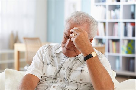 sadness - Senior man with head in hand Stock Photo - Premium Royalty-Free, Code: 614-06169292