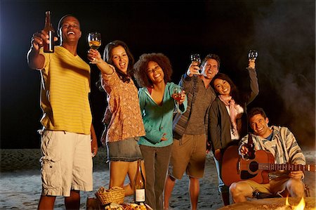 seis - Friends having beach party at night Foto de stock - Sin royalties Premium, Código: 614-06169407