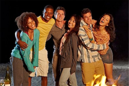 party and afro american - Friends having beach party at night Stock Photo - Premium Royalty-Free, Code: 614-06169409