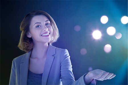 futuristic joy - Young woman with lights Stock Photo - Premium Royalty-Free, Code: 614-06169431