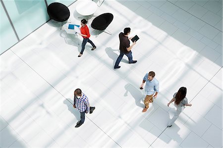 people busy viewed from above - People walking on office concourse Stock Photo - Premium Royalty-Free, Code: 614-06169555