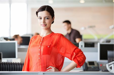 Businesswoman in office Fotografie stock - Premium Royalty-Free, Codice: 614-06169570