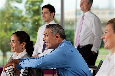 Businesspeople at presentation Stock Photo - Premium Royalty-Free, Code: 614-06311657