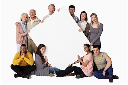 portrait young man white background - Group of people holding blank notice board Stock Photo - Premium Royalty-Free, Code: 614-06311782