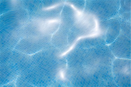 saque - Close up of water in swimming pool Stock Photo - Premium Royalty-Free, Code: 614-06311889