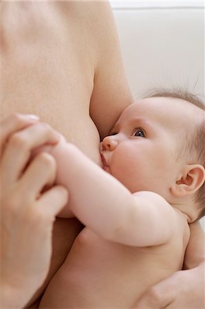 pecho - Mother breastfeeding baby Foto de stock - Sin royalties Premium, Código: 614-06312005