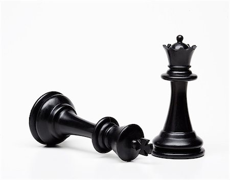 pair - Chess queen and king piece, king fallen Stock Photo - Premium Royalty-Free, Code: 614-06336027