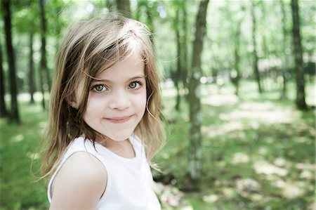 Girl in forest Stock Photo - Premium Royalty-Free, Code: 614-06336308