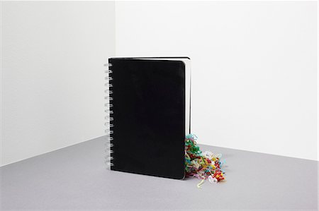 simsearch:614-06336430,k - Notebook with streamers inside Stock Photo - Premium Royalty-Free, Code: 614-06336412