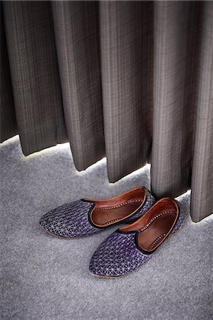 Slippers by a curtain Stock Photo - Premium Royalty-Free, Code: 614-06402974