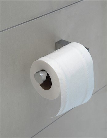 Toilet roll on holder Foto de stock - Sin royalties Premium, Código: 614-06402985