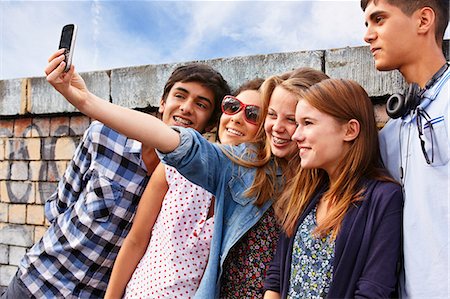 simsearch:614-06403067,k - Teenage friends photographing themselves with smartphone Stock Photo - Premium Royalty-Free, Code: 614-06403082