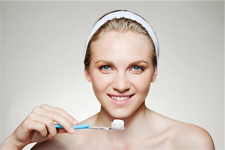 dental care woman - Woman brushing teeth Stock Photo - Premium Royalty-Free, Code: 614-06442327