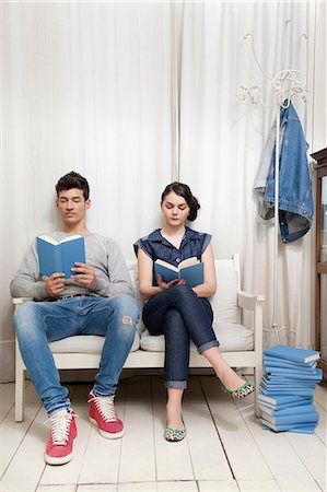 Couple reading books Stock Photo - Premium Royalty-Free, Code: 614-06442453
