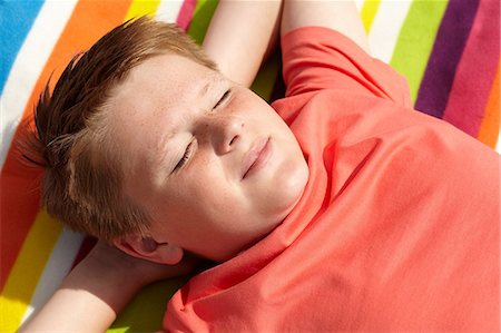 preteen boys in a towel - Boy sunbathing Stock Photo - Premium Royalty-Free, Code: 614-06442481