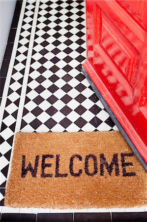 floor tiles entrance hall - Welcome mat Stock Photo - Premium Royalty-Free, Code: 614-06442521
