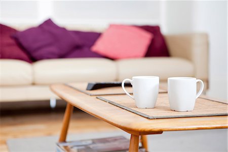 Two coffee cups on coffee table Stock Photo - Premium Royalty-Free, Code: 614-06442548