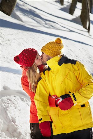 Couple kissing in snow Stock Photo - Premium Royalty-Free, Code: 614-06442679